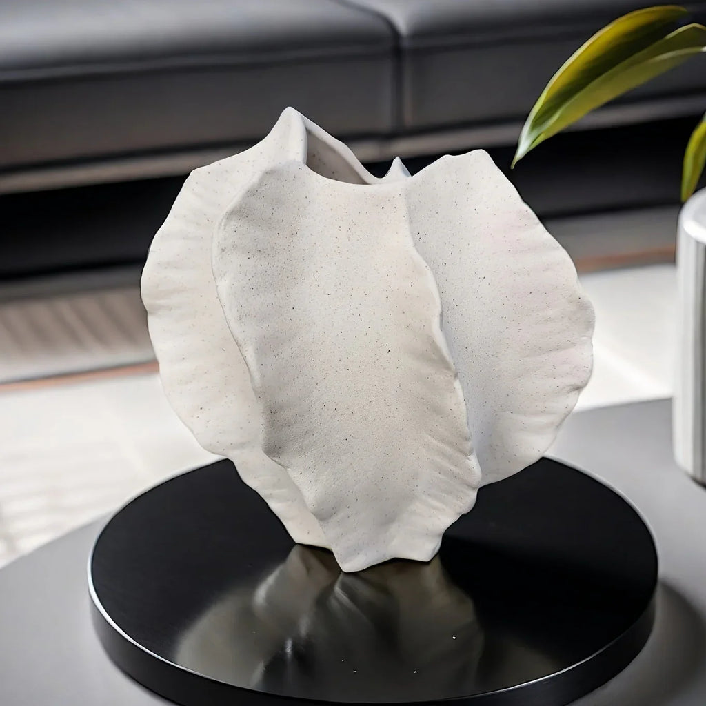 Beige Ceramic Vase with Textured Art Design and Smooth Interior, angled view - House Of Avana