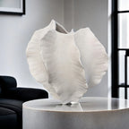 Beige Ceramic Vase with Textured Art Design and Smooth Interior, angled view - House Of Avana