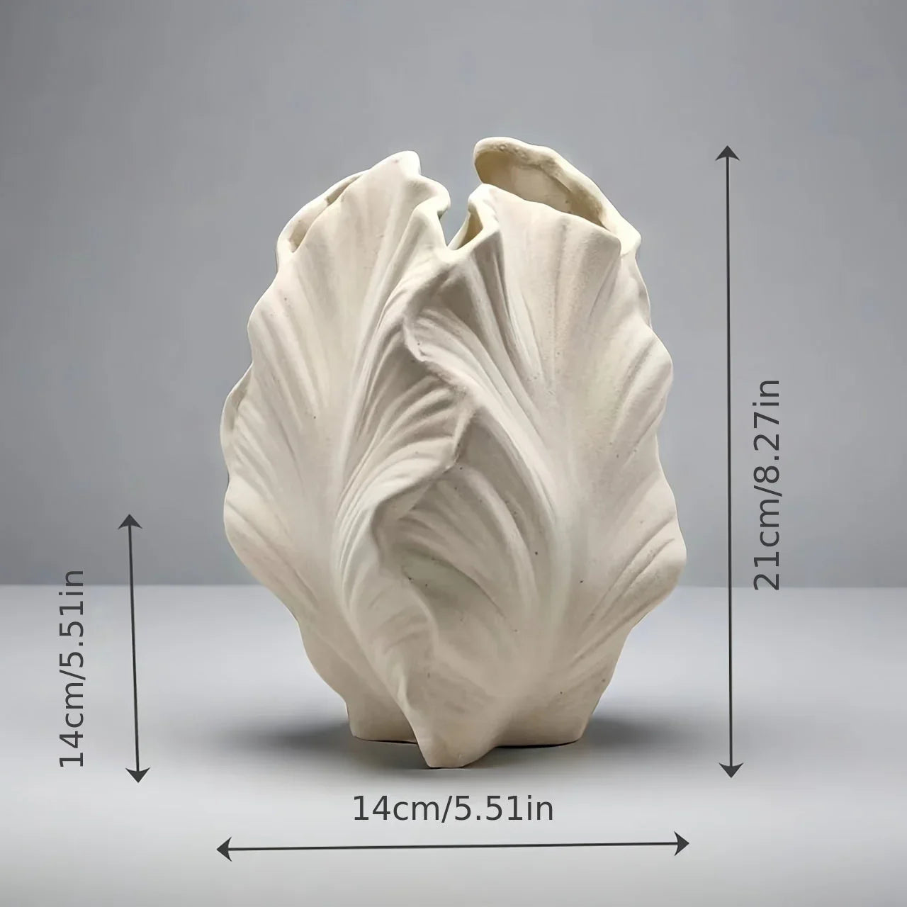 Ceramic White Oval Vase with Textured Leaf Design, angled view - House Of Avana