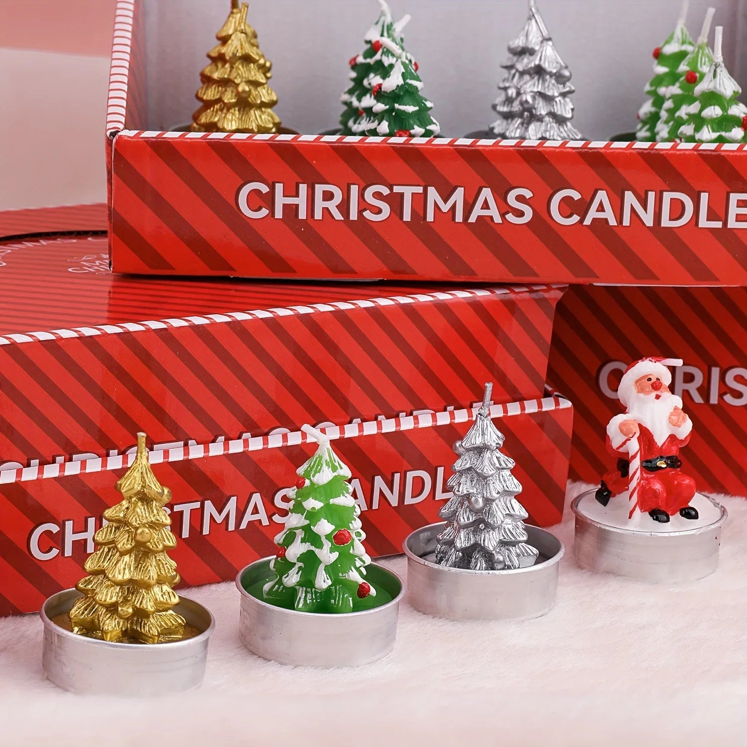 Wax Christmas Candles with Santa and Snowman Designs in Red and White, angled view - House Of Avana