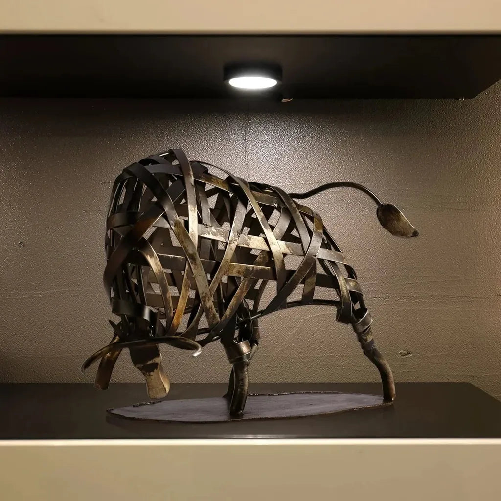 Woven metal bull sculpture with rustic finish and intricate lattice design as a unique metal animal decor piece