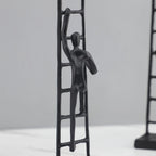 Abstract Sculpture - Metal Silver Climbing Stairs Design, close-up view - House Of Avana