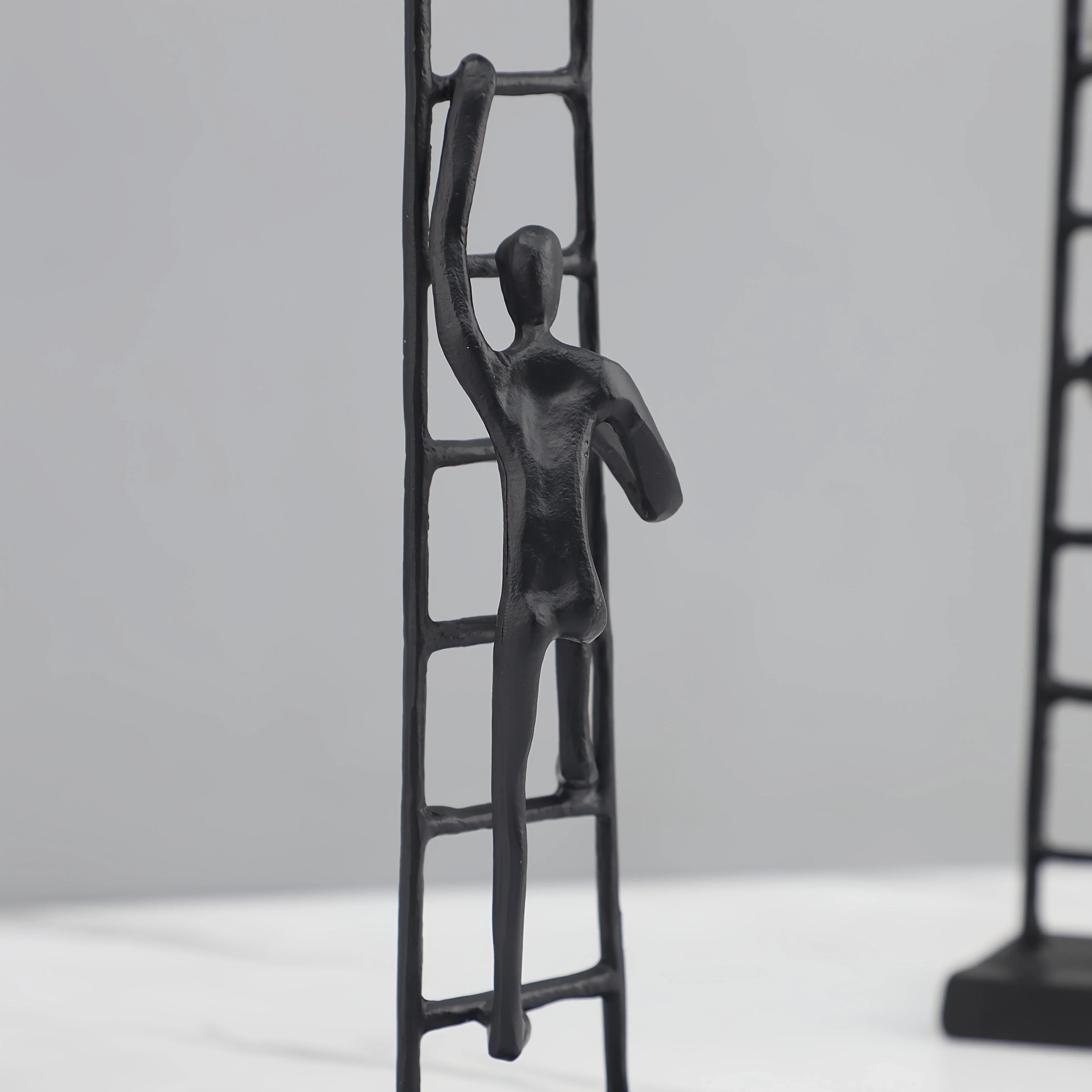 Abstract Sculpture - Metal Silver Climbing Stairs Design, close-up view - House Of Avana