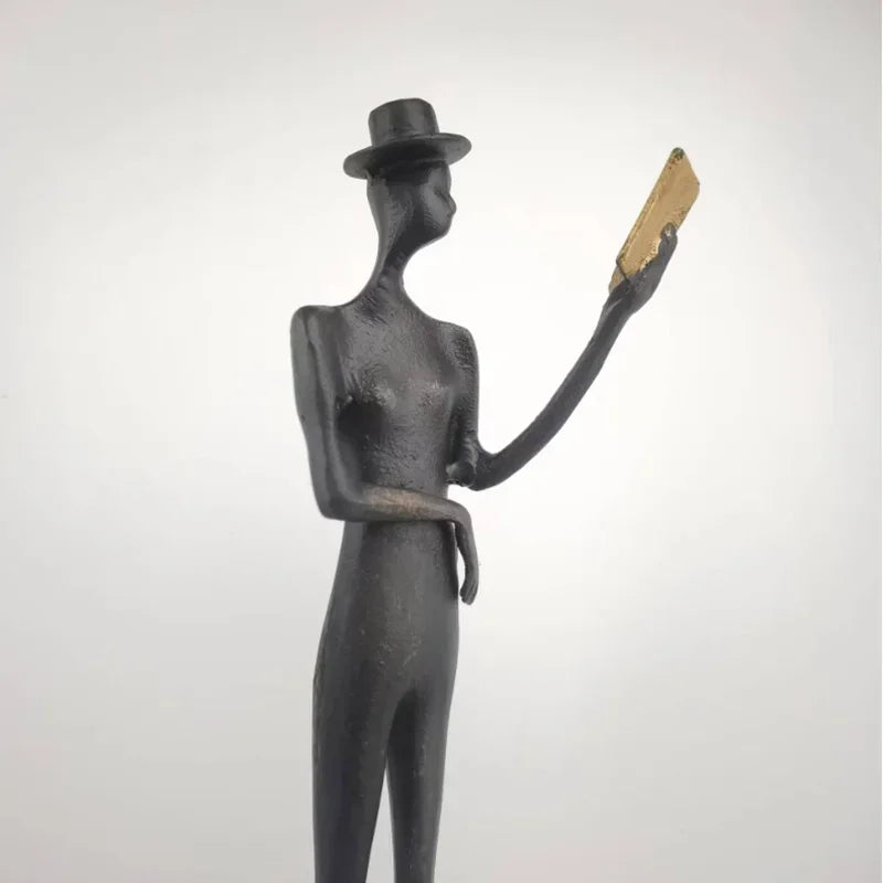 Abstract Statue - Iron Reading Figure, back view - House Of Avana