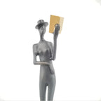 Abstract Statue - Iron Reading Figure, close-up view - House Of Avana