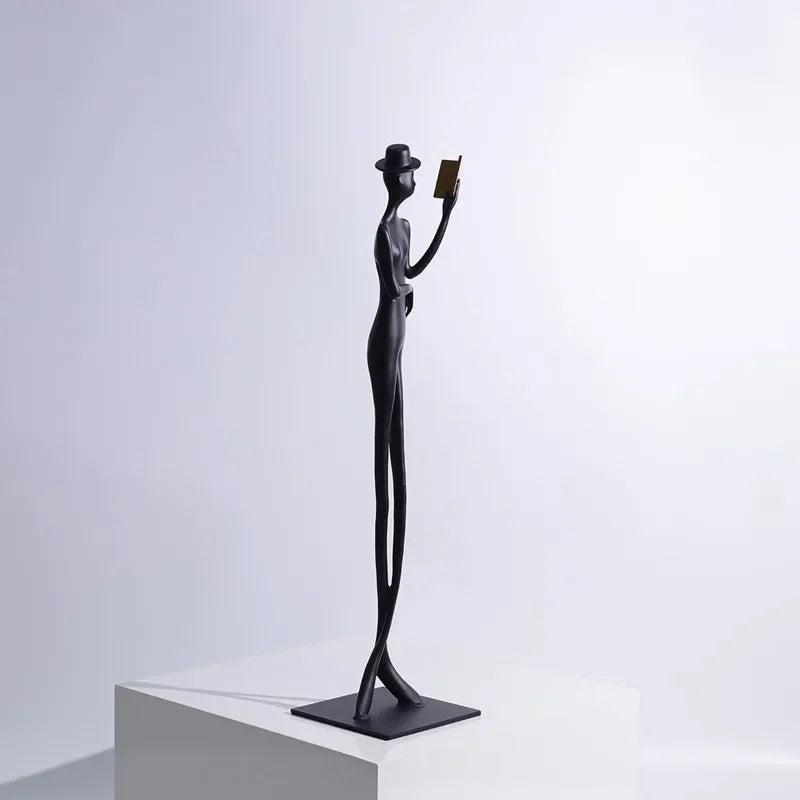 Abstract Statue - Iron Reading Figure, side view - House Of Avana