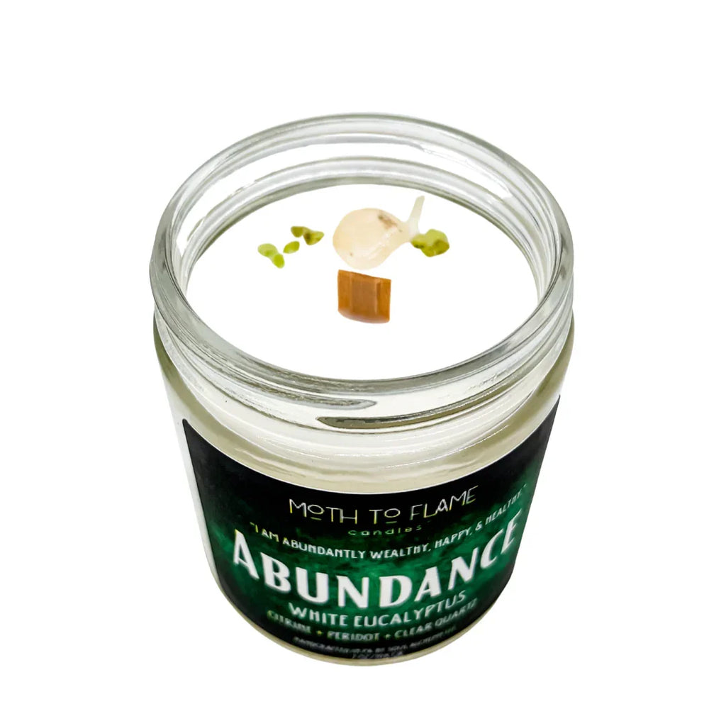 White ceramic candle holder with abundant greenery, 7 oz soy wax candle - House of Avana