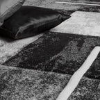 Grey and black area rug with contour cut edges, checkered pattern - House of Avana