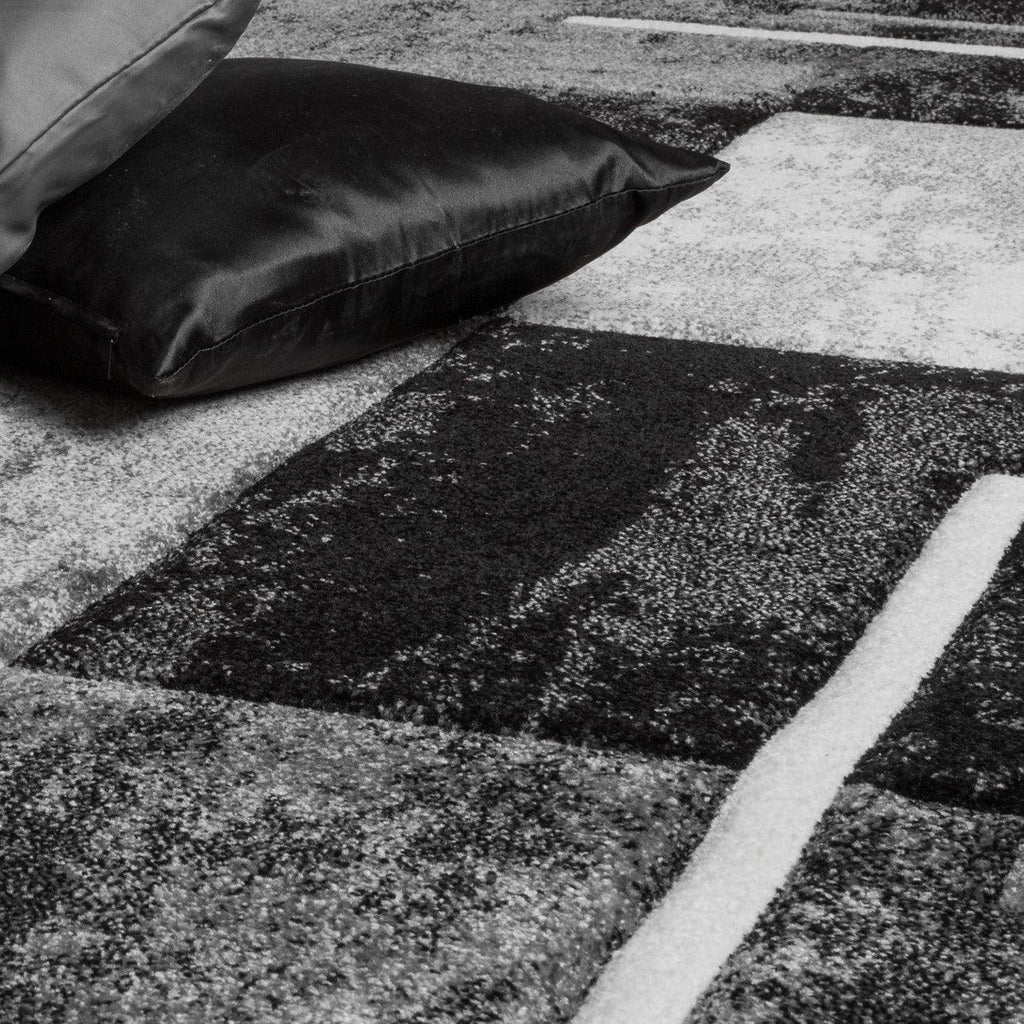 Grey and black area rug with contour cut edges, checkered pattern - House of Avana