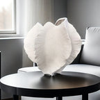 Beige ceramic vase with textured art design, smooth interior - House of Avana