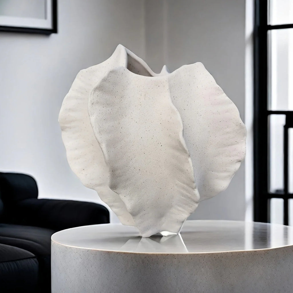 Beige Ceramic Vase with Textured Art Design and Smooth Interior, angled view - House Of Avana