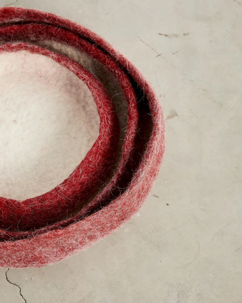 Berry Red Decorative Wool Nesting Bowls, angled view - House Of Avana