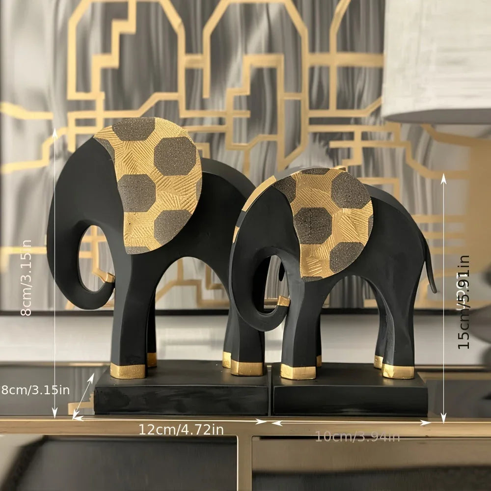 Black gold resin elephant figurine, 2-piece decorative statue set - House of Avana