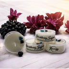 Small crystal candle in blackberry hue, coconut-soy wax tea light - House of Avana