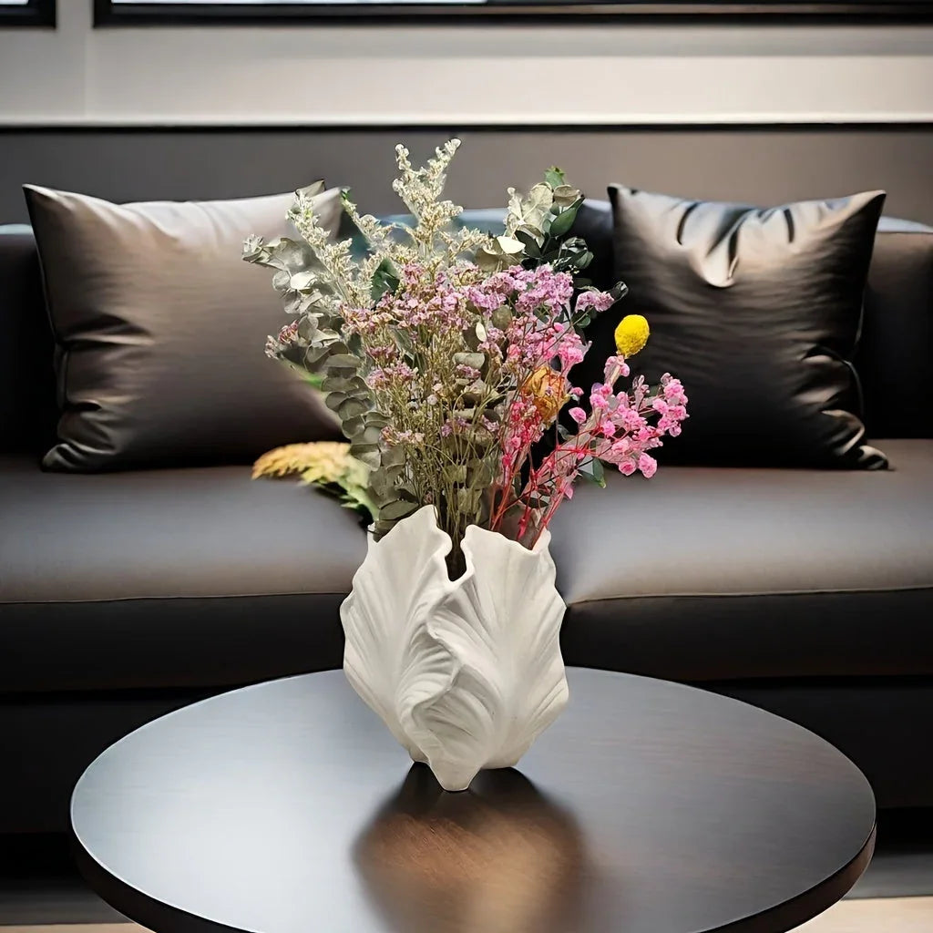 White ceramic vase with textured leaf design, oval shape - House of Avana