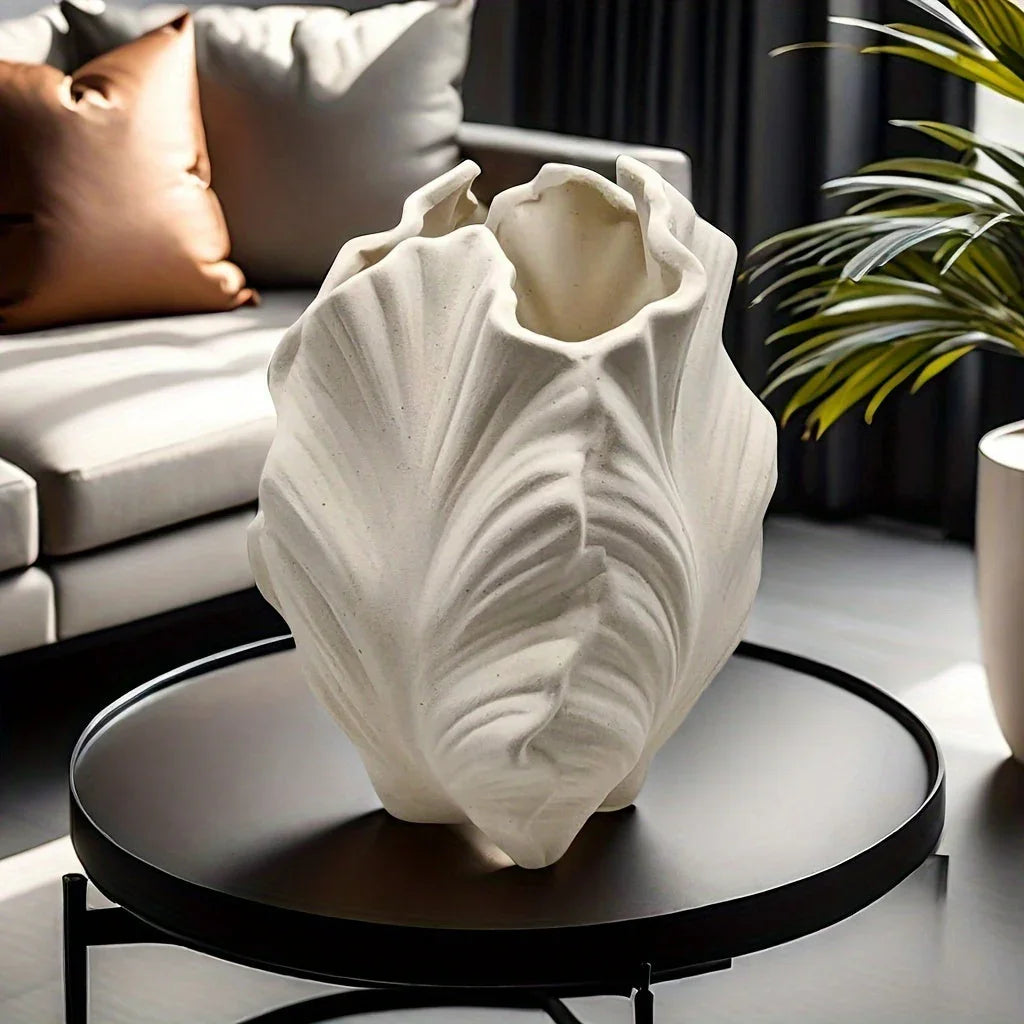 White ceramic vase with textured leaf design, oval shape - House of Avana