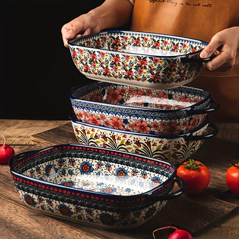 Two rectangular porcelain baking dishes with colorful bohemian floral patterns and side handles.
