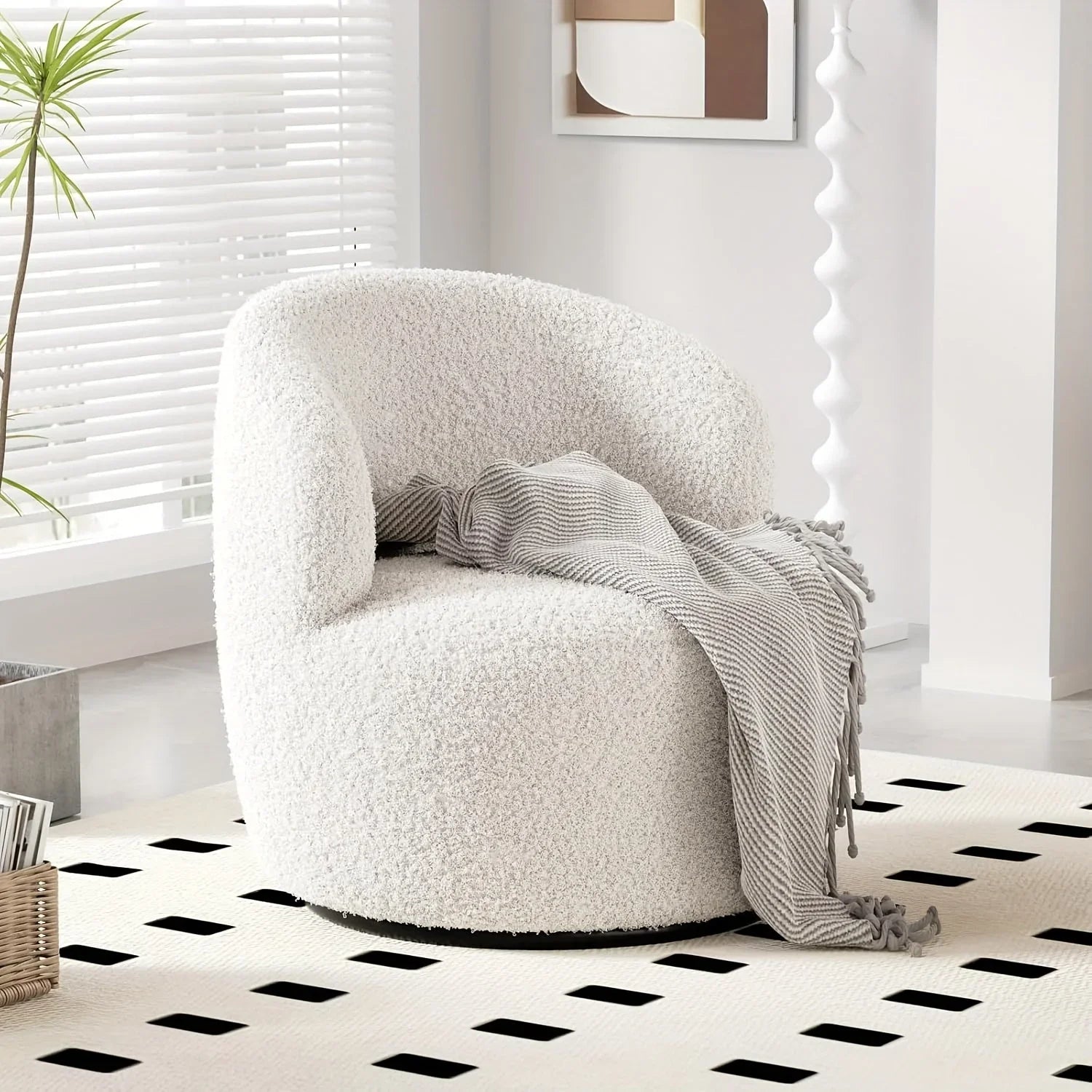 Brown boucle accent chair with 360-degree swivel base, upholstered in textured fabric - House of Avana