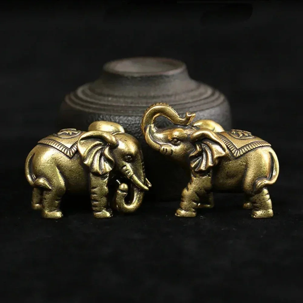Bronze miniature elephant figurines, intricate details, metallic finish - House of Avana