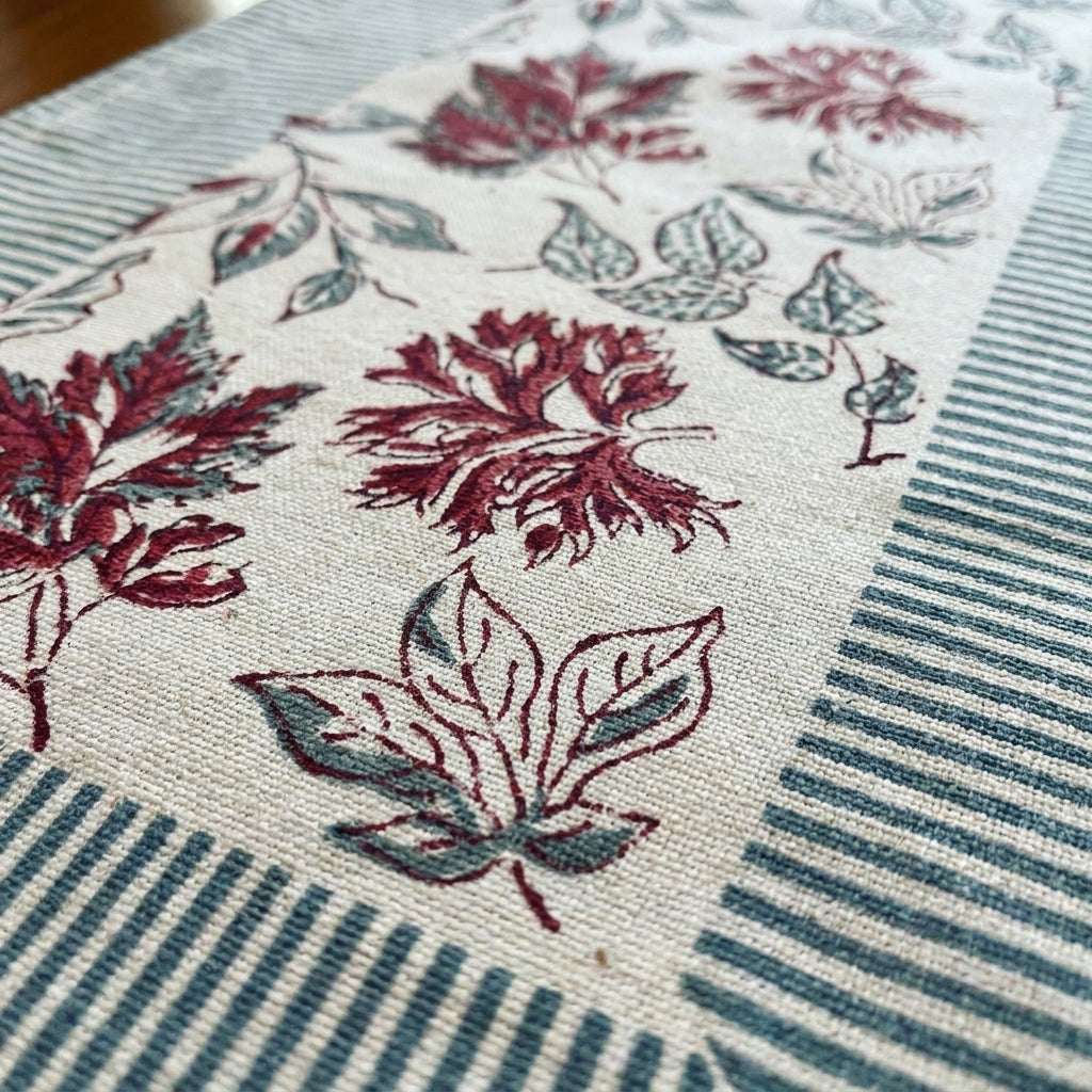 Burgundy & Slate Blue Indian floral print fabric texture close-up | handmade Jaipur handicraft table runners table mats napkins hand block India natural colors aesthetics | House of Avana [[SKU:HOA-TR-BUSB-005]]