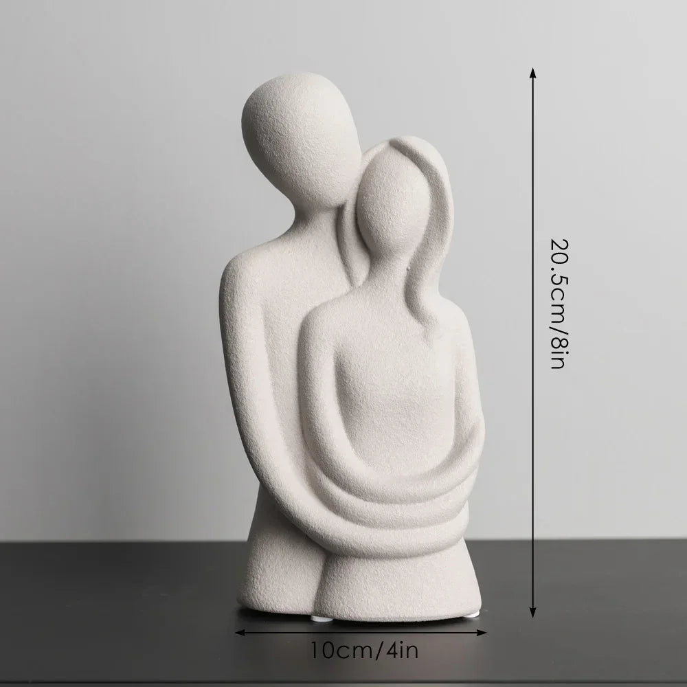 White ceramic couple sculpture, embracing figures, modern décor - House of Avana