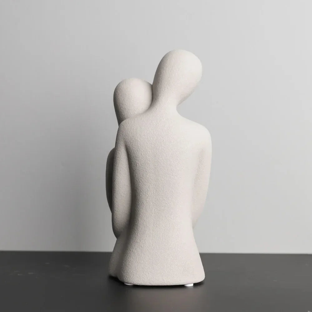White ceramic couple sculpture, embracing figures, modern décor - House of Avana