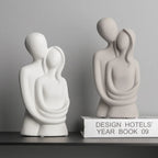 White ceramic couple sculpture, embracing figures, modern décor - House of Avana