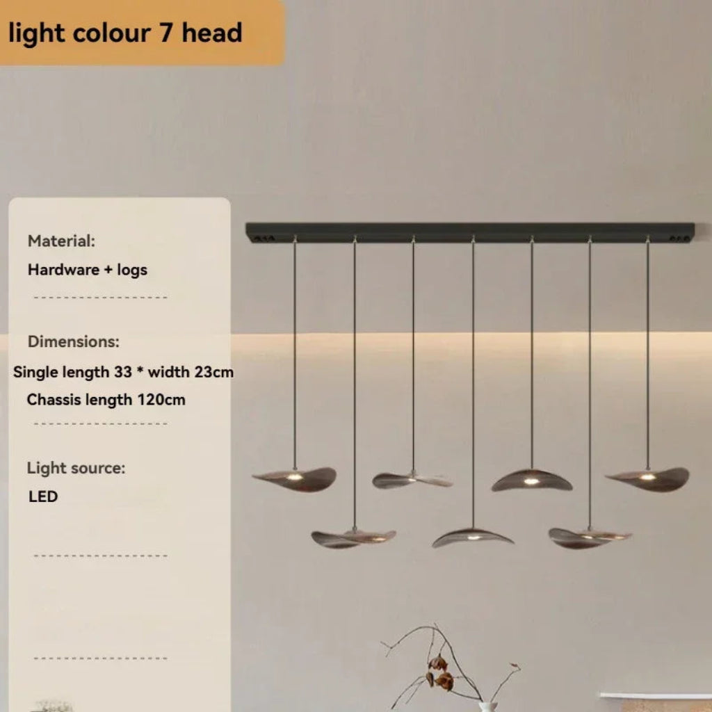Modern pendant light with hanging lights on a neutral background