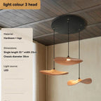 Three wooden pendant lights hanging from the ceiling with product details on the left.