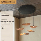 Modern pendant light fixture with wooden shades in a room setting, featuring product details on the left.