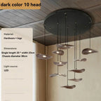 Modern chandelier with dark color and 10 heads, mounted on a ceiling.