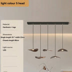 Modern pendant light fixture with specifications on a neutral background