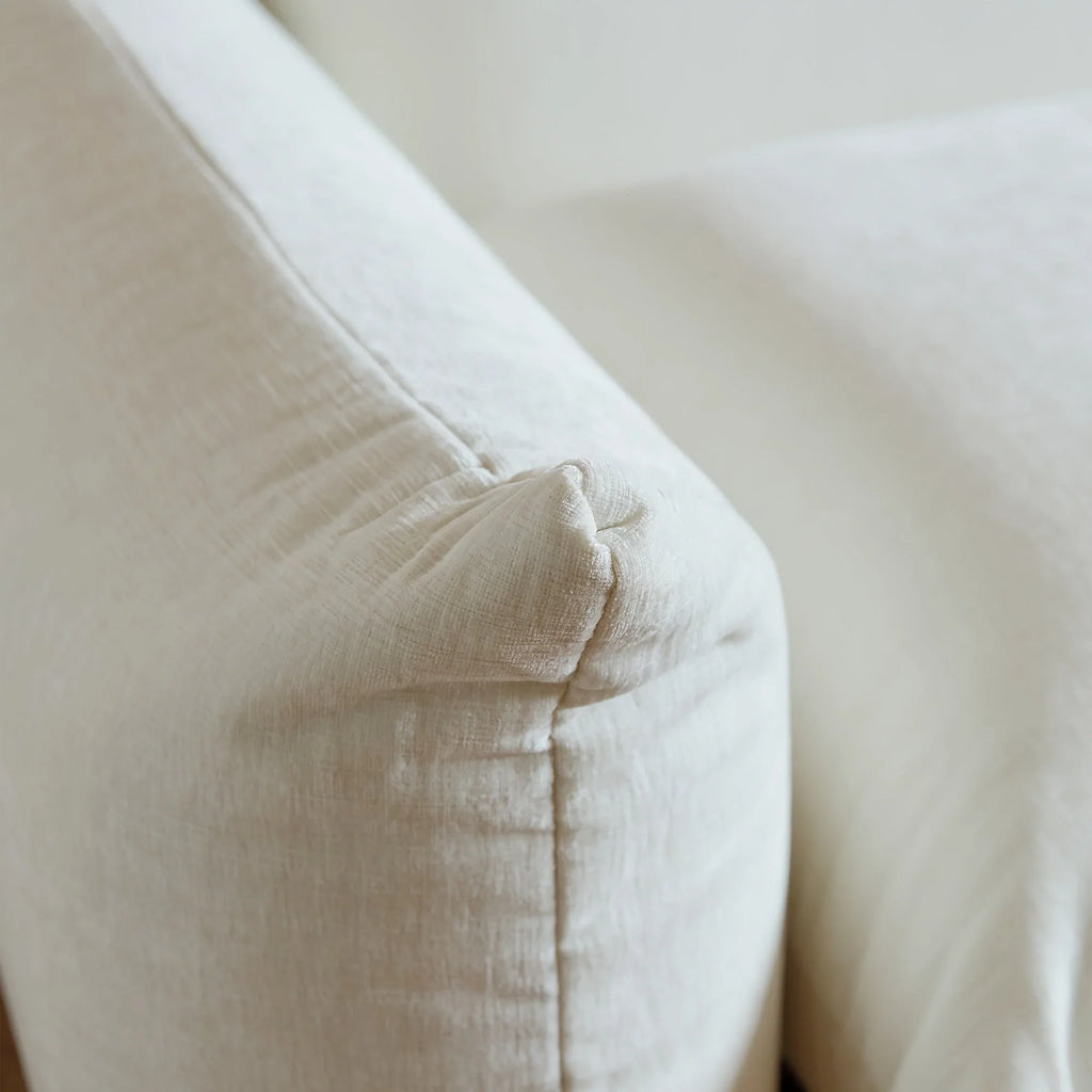 Beige chenille sofa chair in compact space, soft fabric upholstery - House of Avana