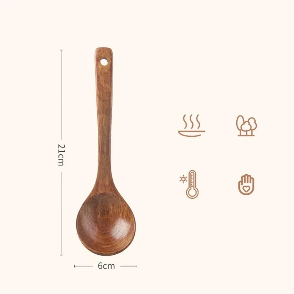A smooth medium brown wooden cooking spoon with a rounded bowl and a handle hole for hanging in eco friendly wooden cooking spoons