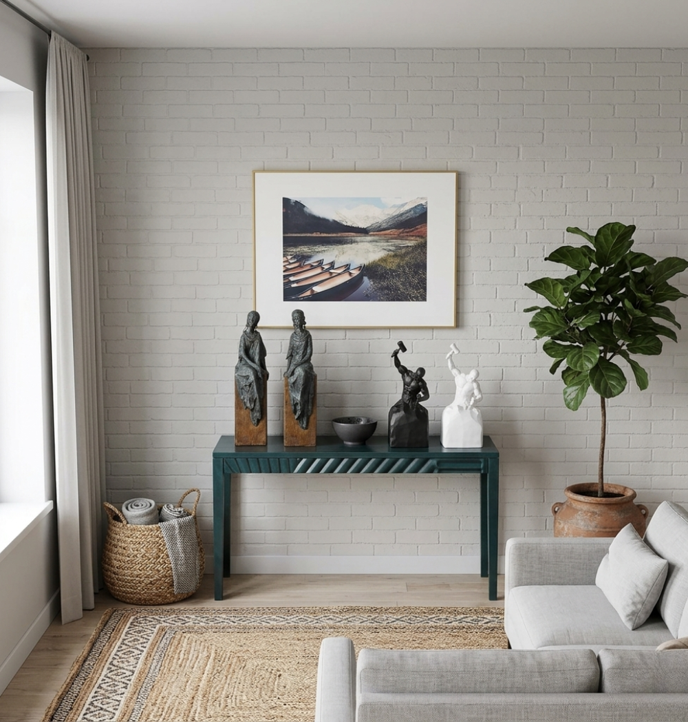 Decorative figurine sculptures on teal console table with wall art, jute rug and indoor plant in modern living room - House of Avana