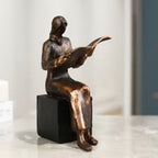 Small Reader Bookend Sculpture – Black Resin [[SKU:HOA-BKE-002]]