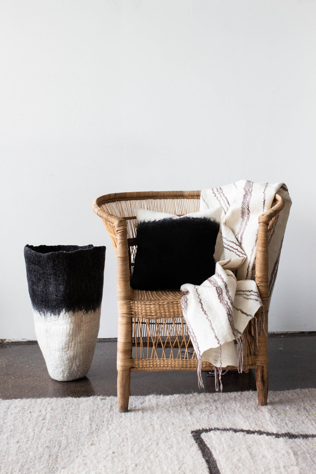 Eclipse Black & White Wool Floor Vase, angled view - House Of Avana