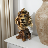 Lion statue on a white surface next to a large vase