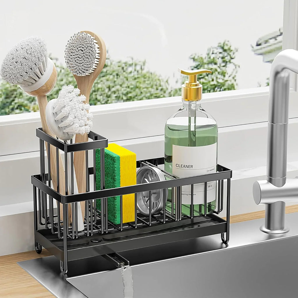 Kitchen sink caddy with cleaning utensils and a bottle of cleaner on a kitchen counter.