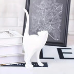 White ceramic cat figurine, modern artistic design, glossy finish - House of Avana