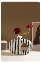 Ceramic Zebra Stripes Vase with Artificial Flowers, Modern Floral Decor, lifestyle image - House Of Avana