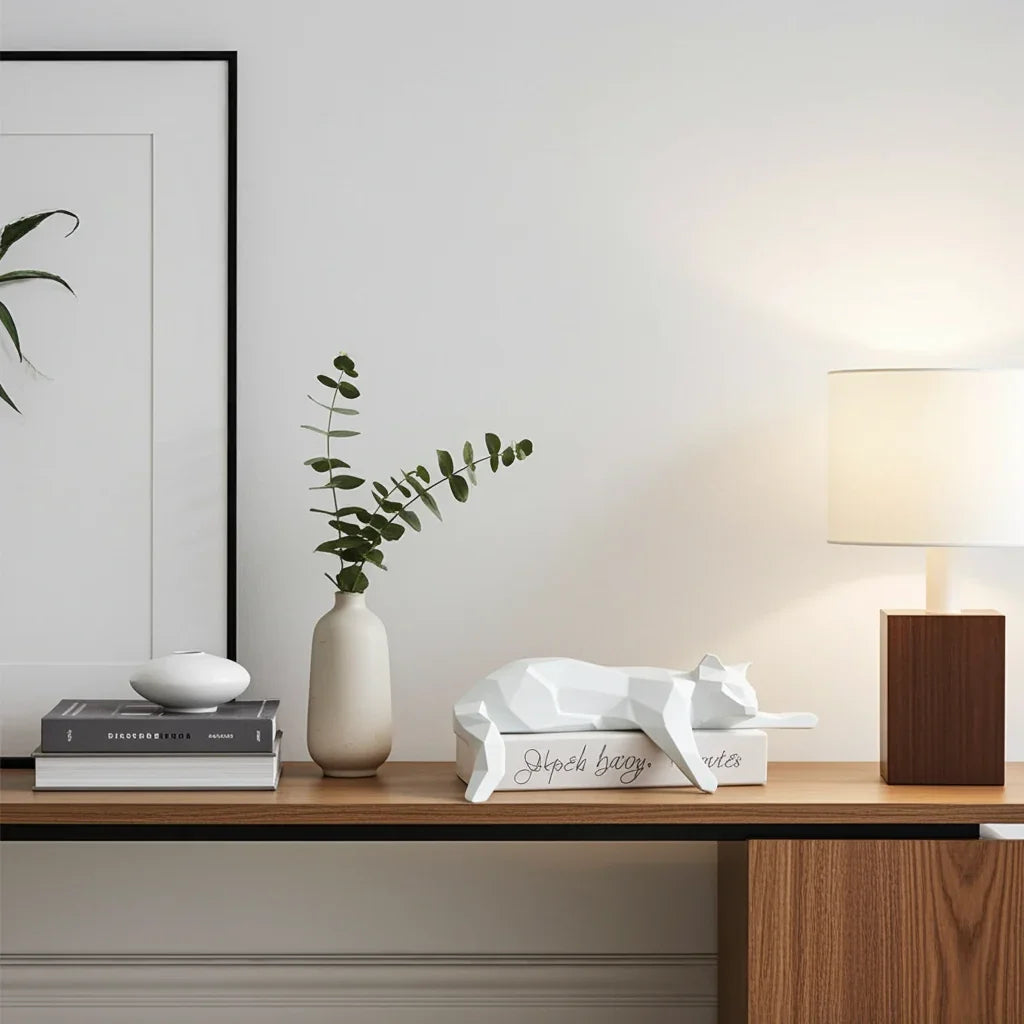 White ceramic cat figurine, lying down with geometric pattern, decorative accent - House of Avana