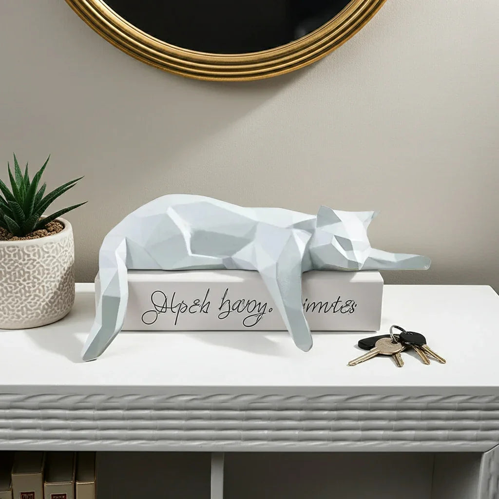 White ceramic cat figurine, lying down with geometric pattern, decorative accent - House of Avana