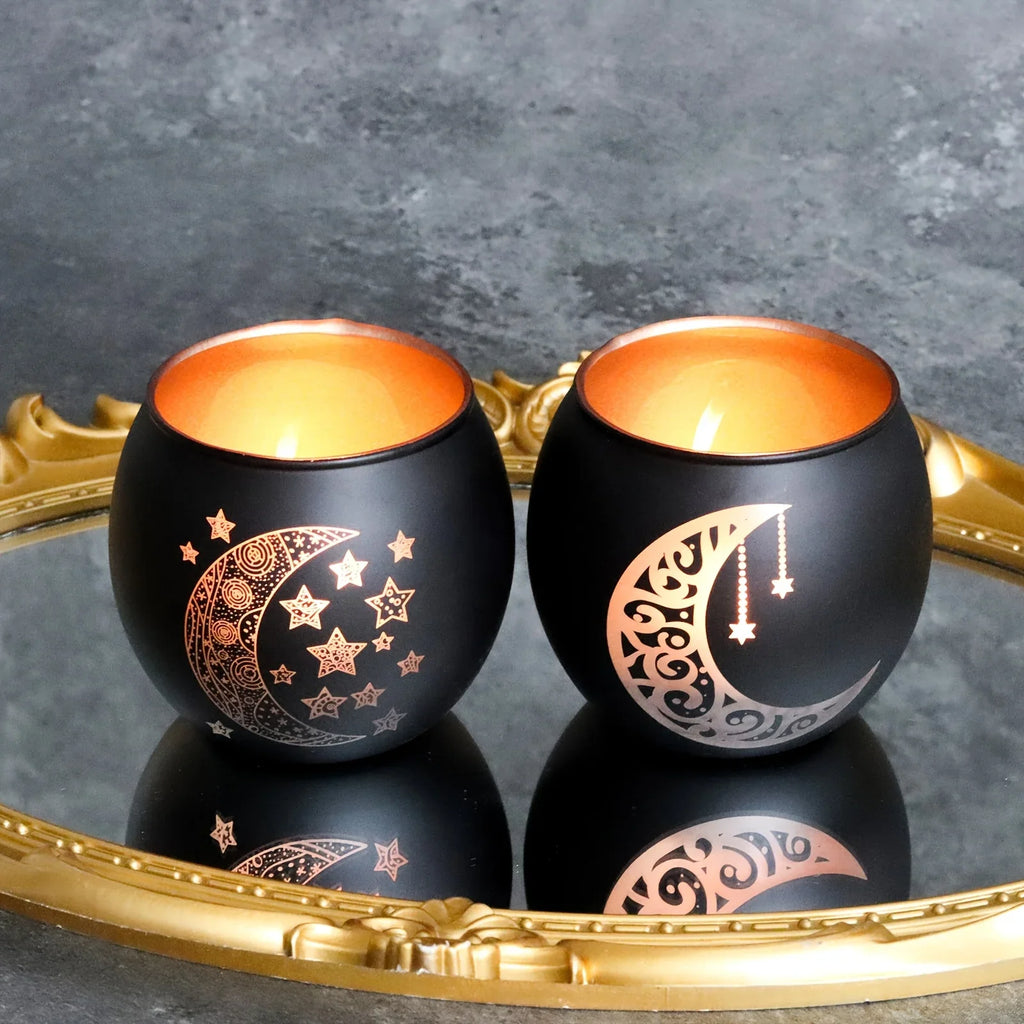 Clear glass candle holder with moon and star design, metallic accents - House of Avana