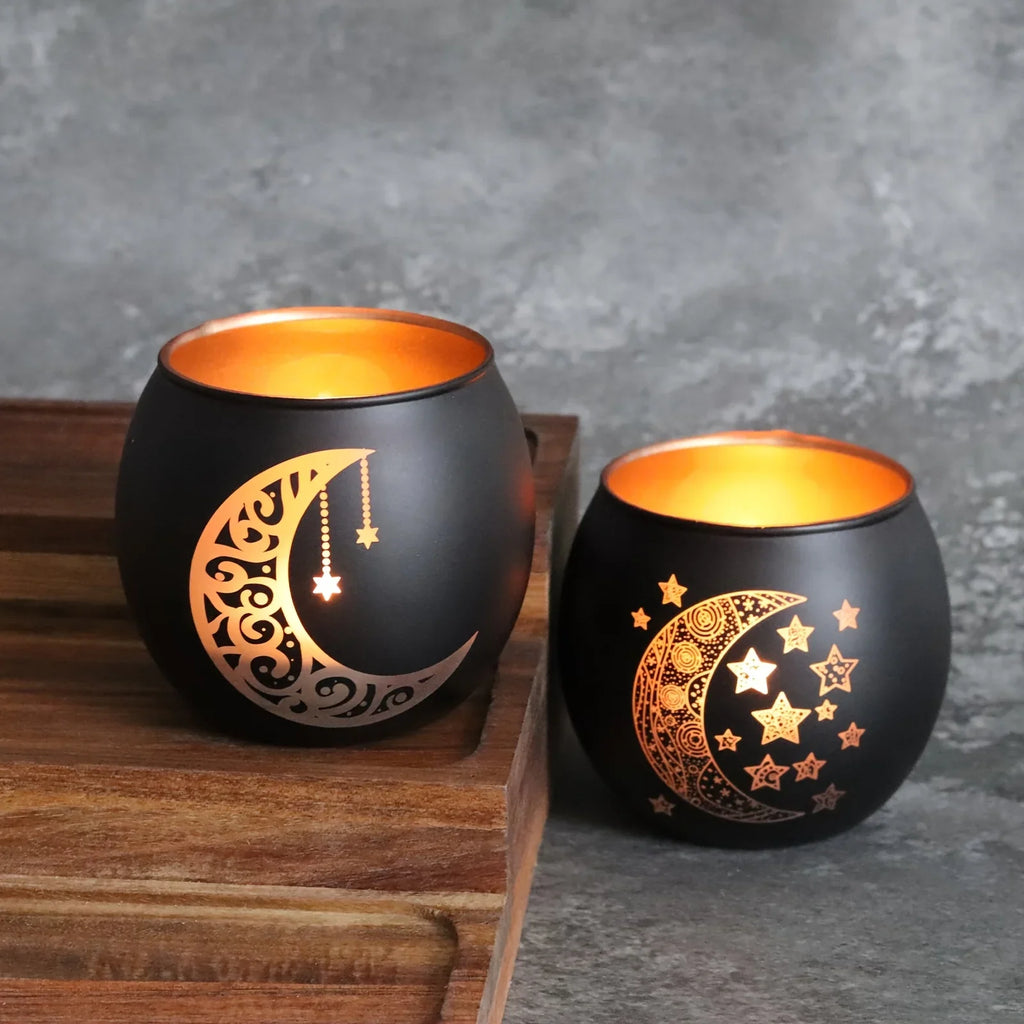 Clear glass candle holder with moon and star design, metallic accents - House of Avana