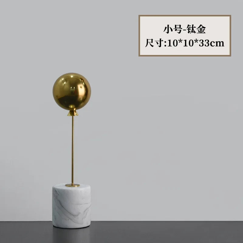 Marble Base Statue - Gold Balloon Sculpture, angled view - House Of Avana