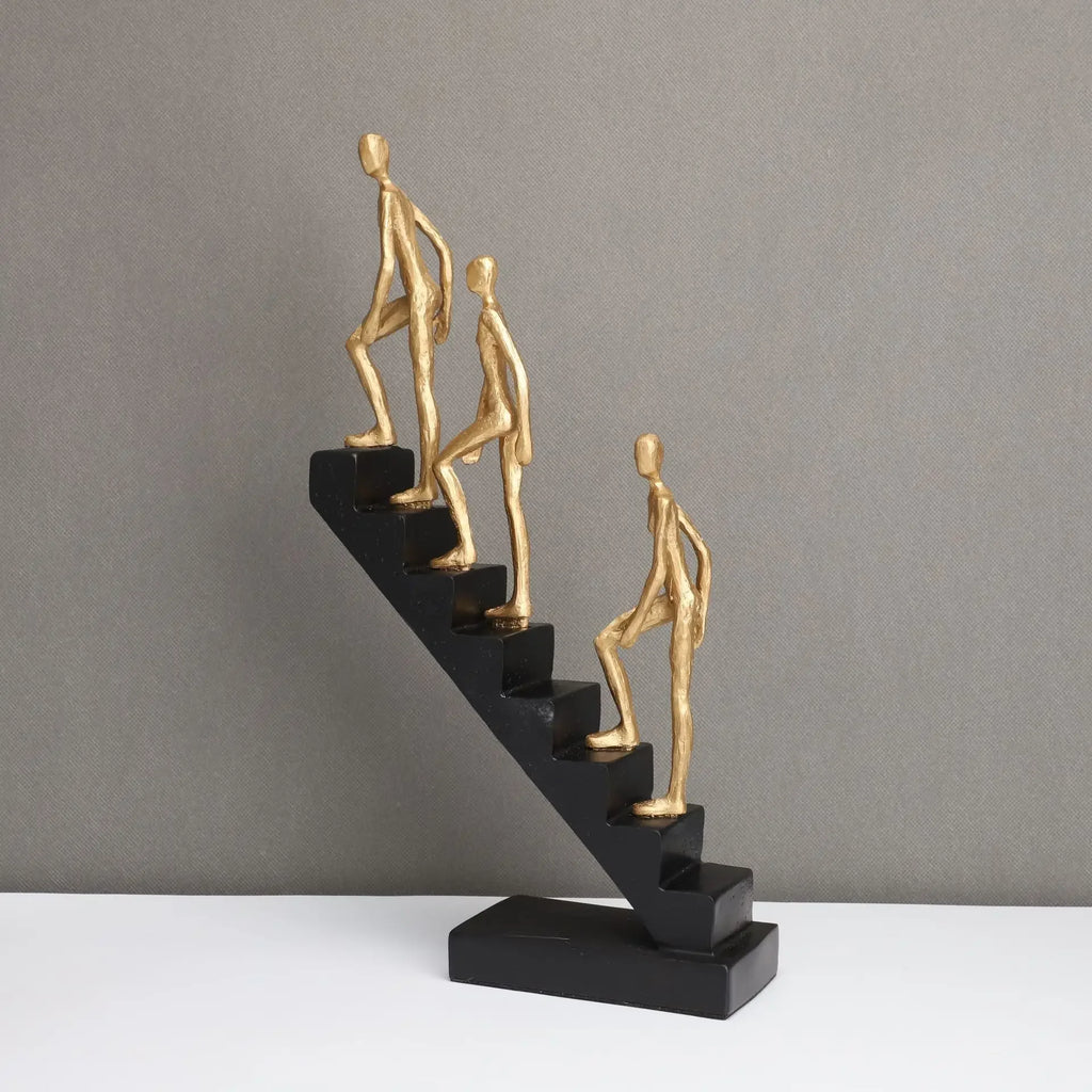 Golden Climber Sculpture - Abstract Modern Artwork, angled view - House Of Avana