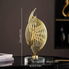 Golden abstract sculpture, metallic finish, unique tabletop design - House of Avana