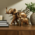 Golden elephant family figurine, metallic gold finish, intricate design - House of Avana