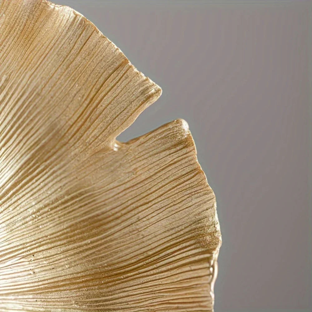 Golden leaf decorative accent, metallic gold finish, ornate details - House of Avana